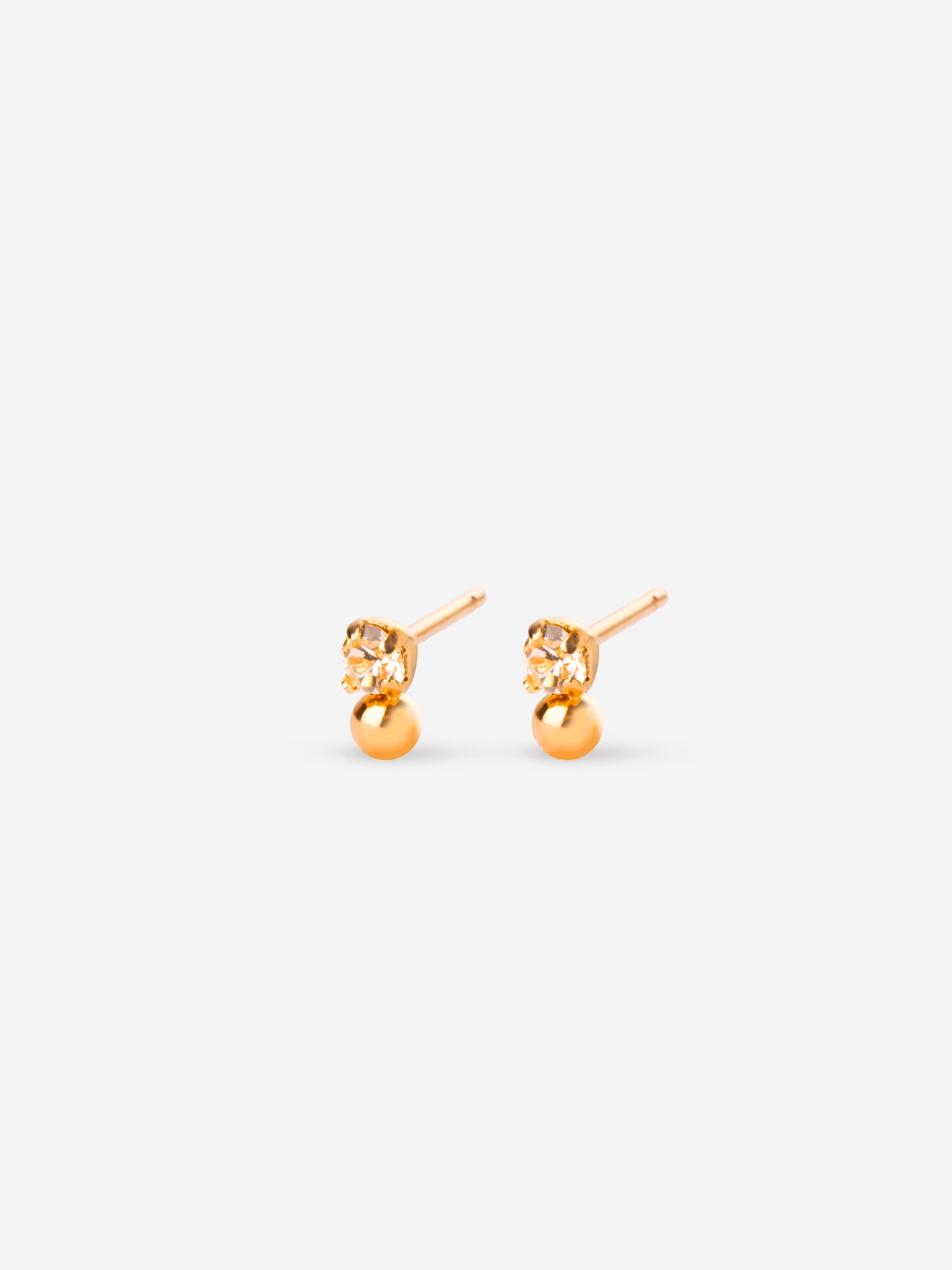 Puce d'oreille minimaliste avec cristal blanc et bille