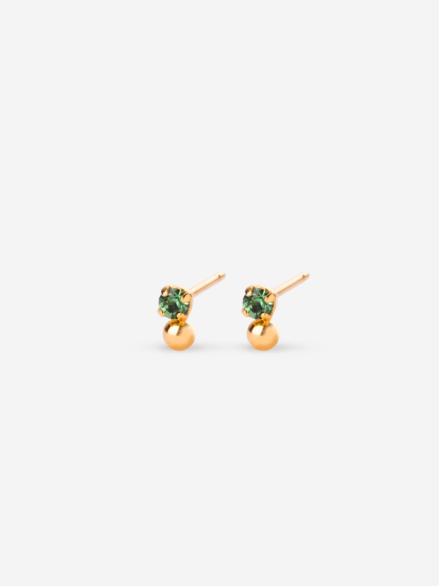 Puce d'oreille minimaliste avec cristal vert et bille