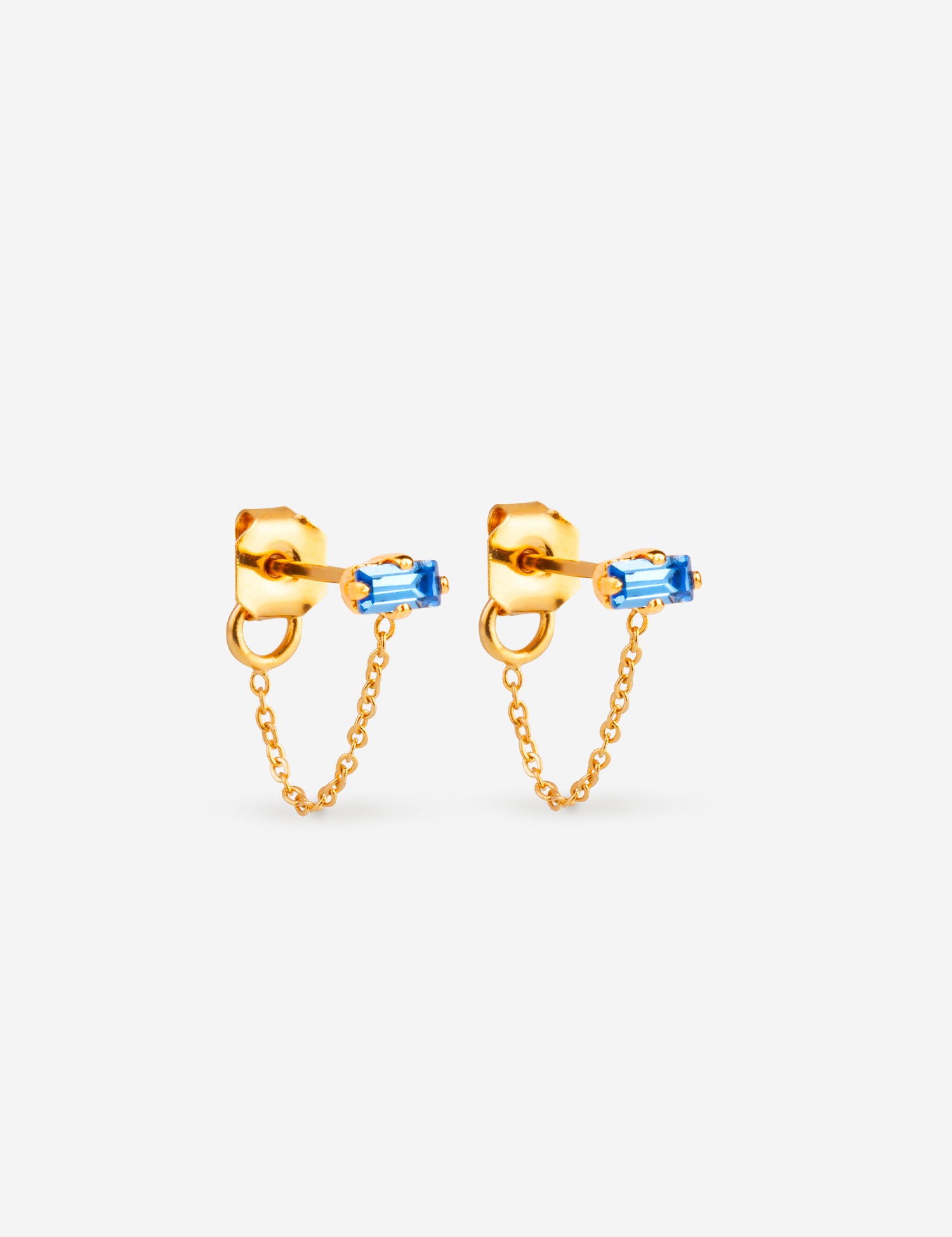 puces d'oreilles dorée chaîne fine, cristal bleu
