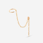 bague d'oreille et puce d'oreille relié par une chaine dorée. Cristaux champagne.