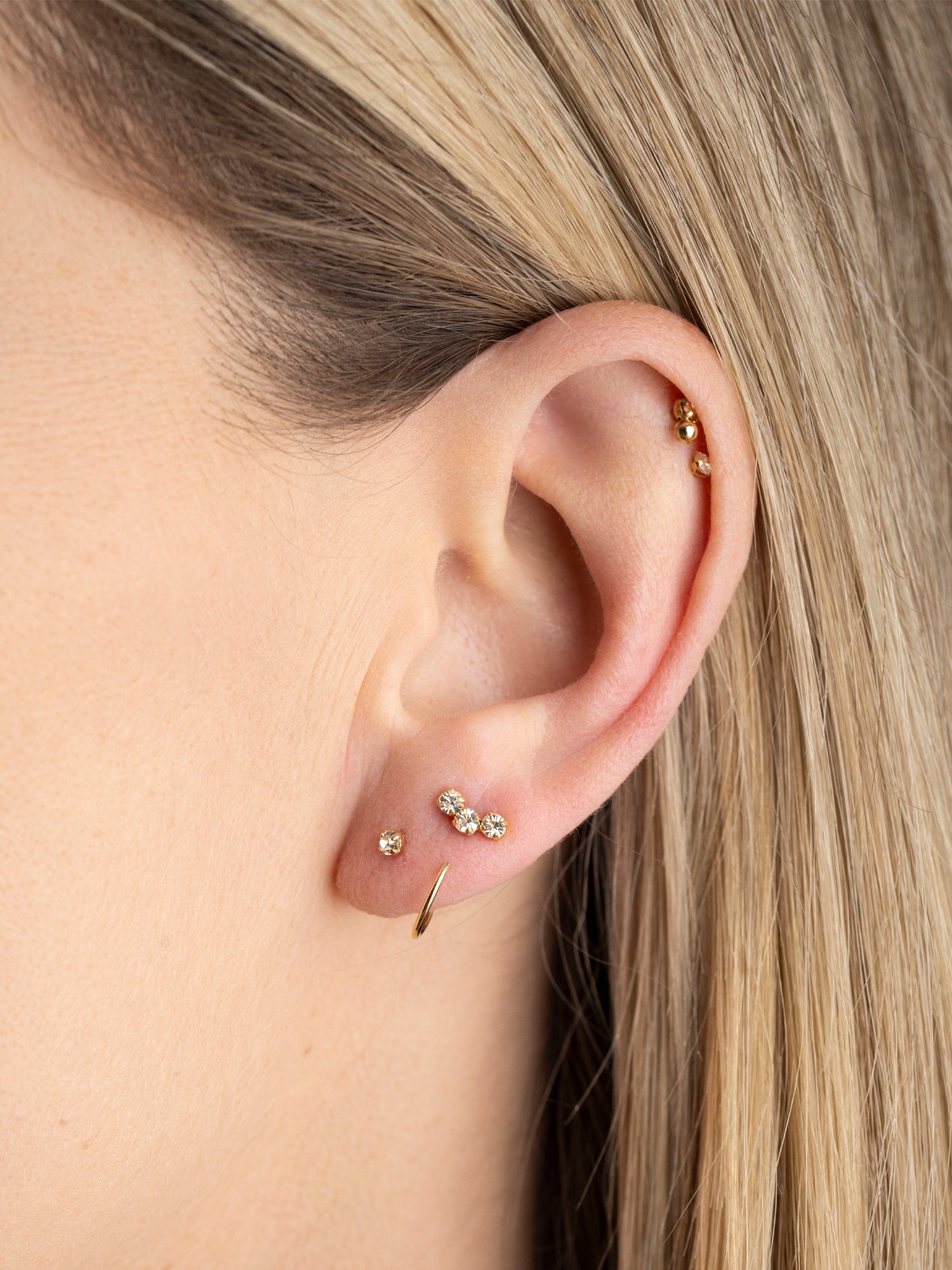 mono boucle twisté avec cristal blanc, puce d'oreille avec trois cristaux blanc, piericng plaqué or
