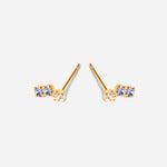 paire de puces d'oreilles champagne et bleu, plaqué or