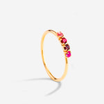 bague plaqué or, quatre cristaux roses et rubis