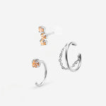 Combinaison de trois bijoux , deux puces d'oreilles champagne et une bague d'oreille avec chaine palladium