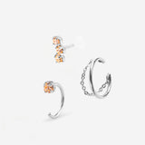 Combinaison de trois bijoux , deux puces d'oreilles champagne et une bague d'oreille avec chaine palladium