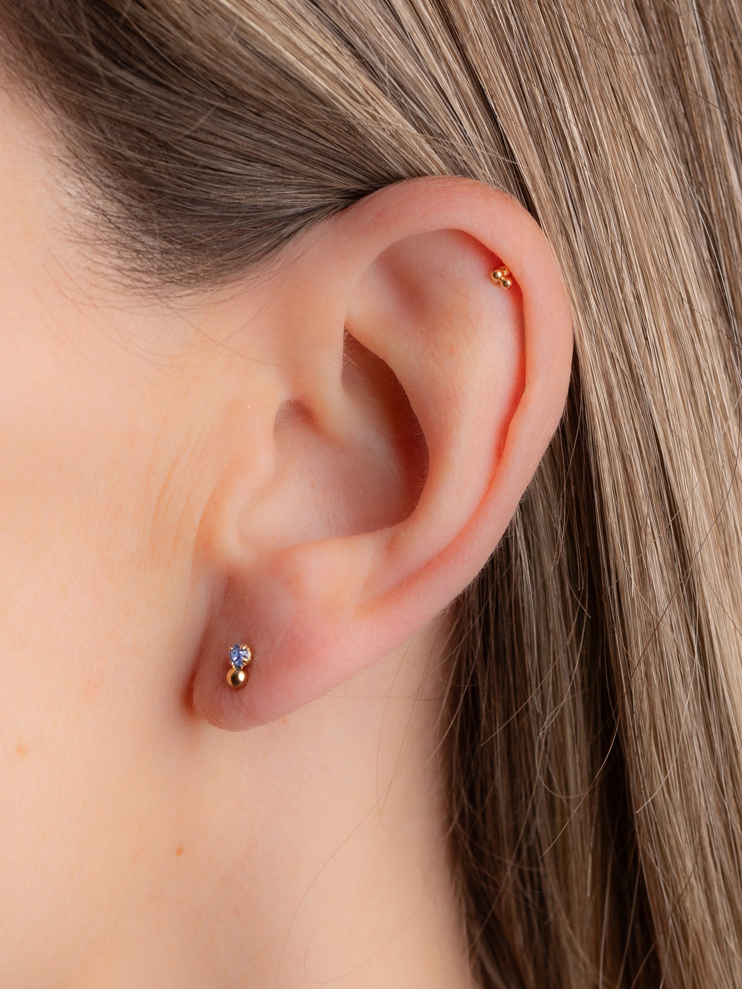 Puce d'oreille minimaliste avec cristal bleu et bille