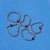 Bague chaîne avec pierre rose