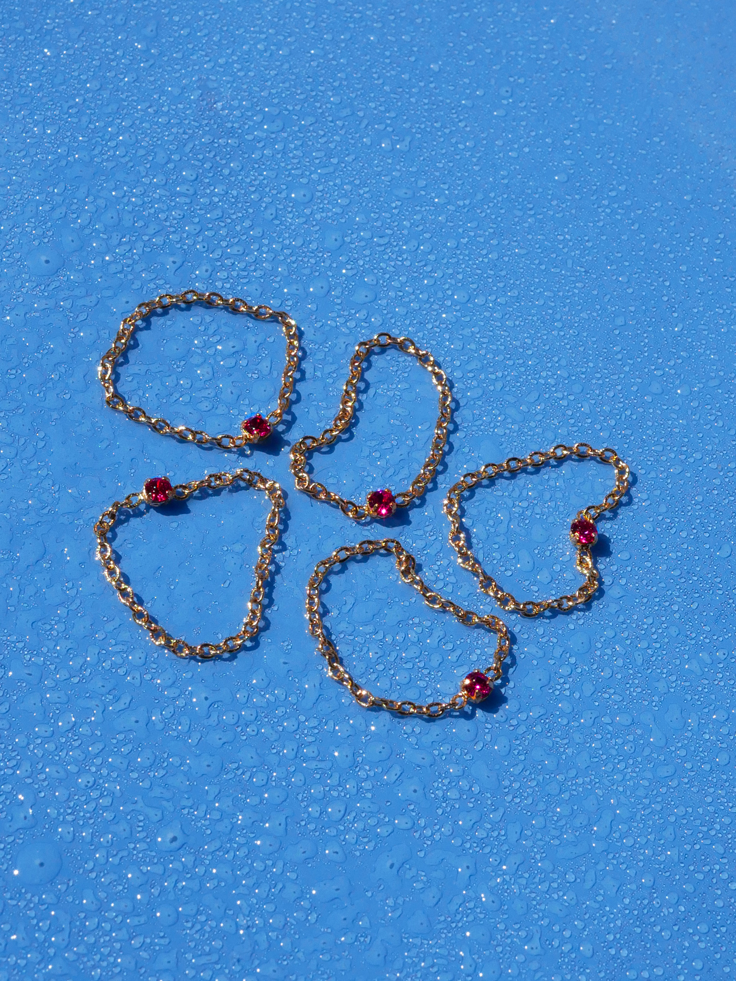 Bague chaîne avec pierre rose