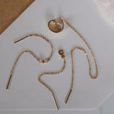 Boucles d'oreilles dorées avec chaîne April Please
